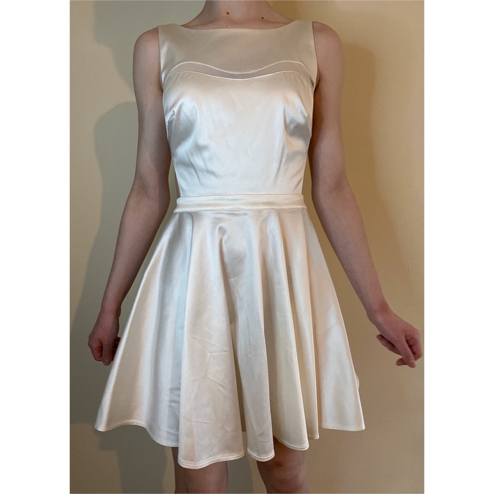 mini dress with side cutouts and mesh detailing